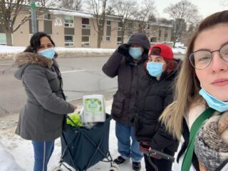 People from the supported independent living program grocery shopping