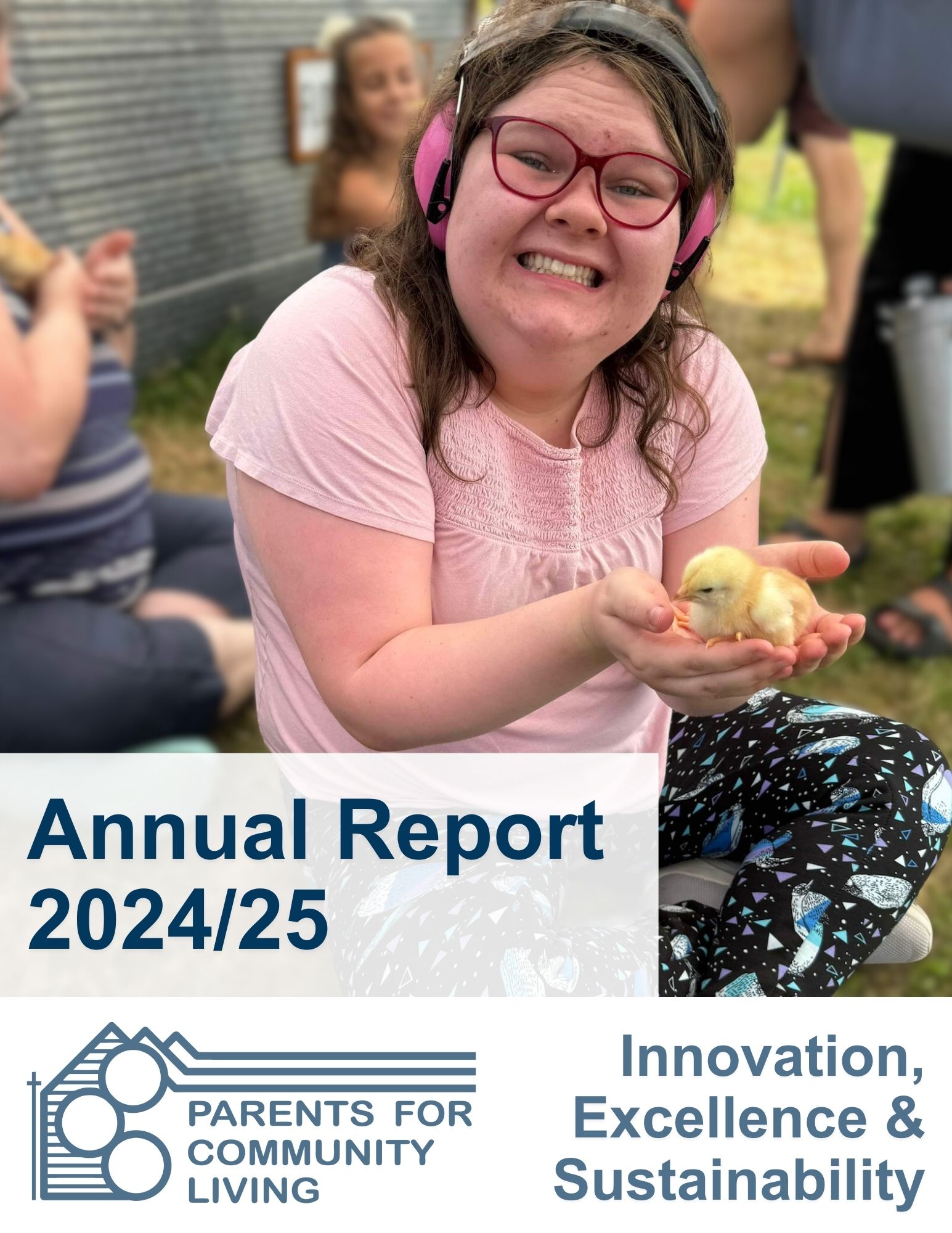 A smiling young woman wearing pink glasses and headphones holds a yellow chick. Other people sit on the grass in the background. Text reads: "Annual Report 2024/25, Parents for Community Living, Innovation, Excellence & Sustainability.
